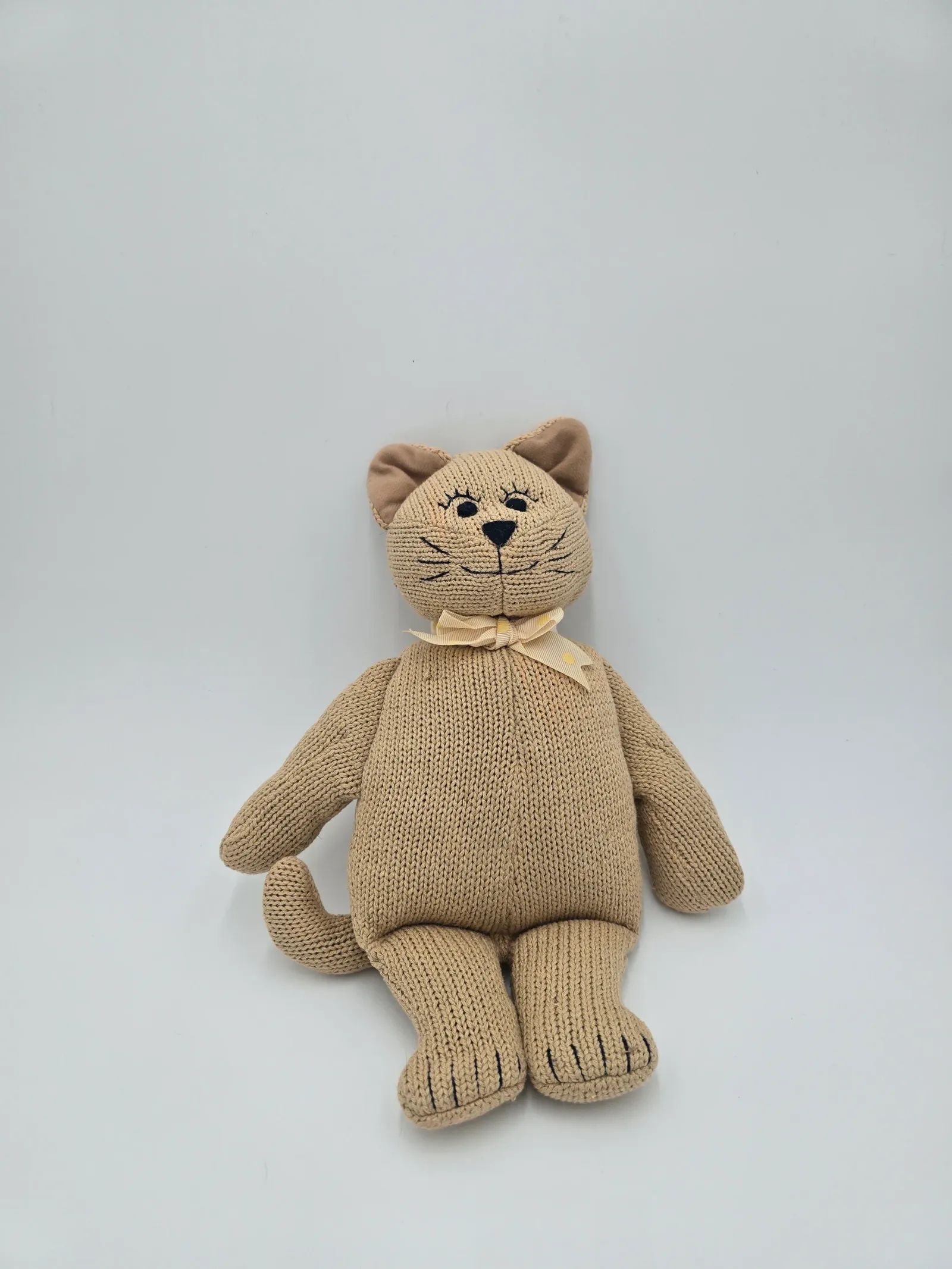 Knitted cat doll