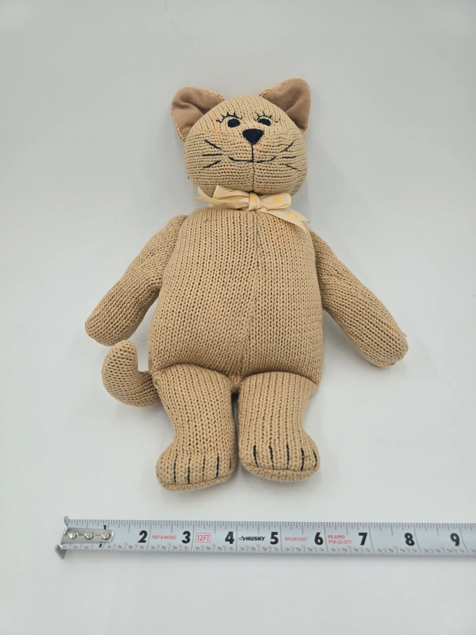 Knitted cat doll