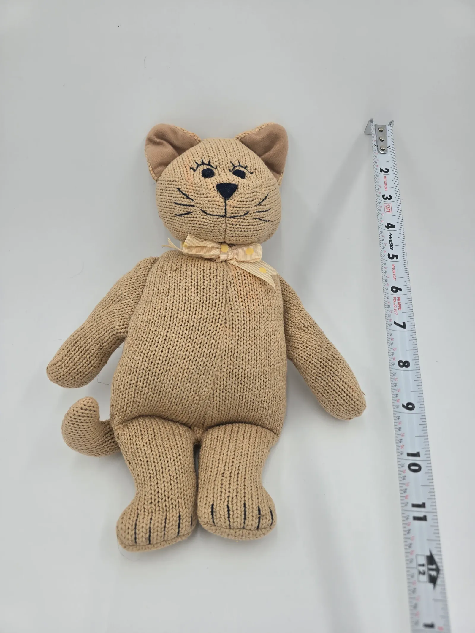 Knitted cat doll
