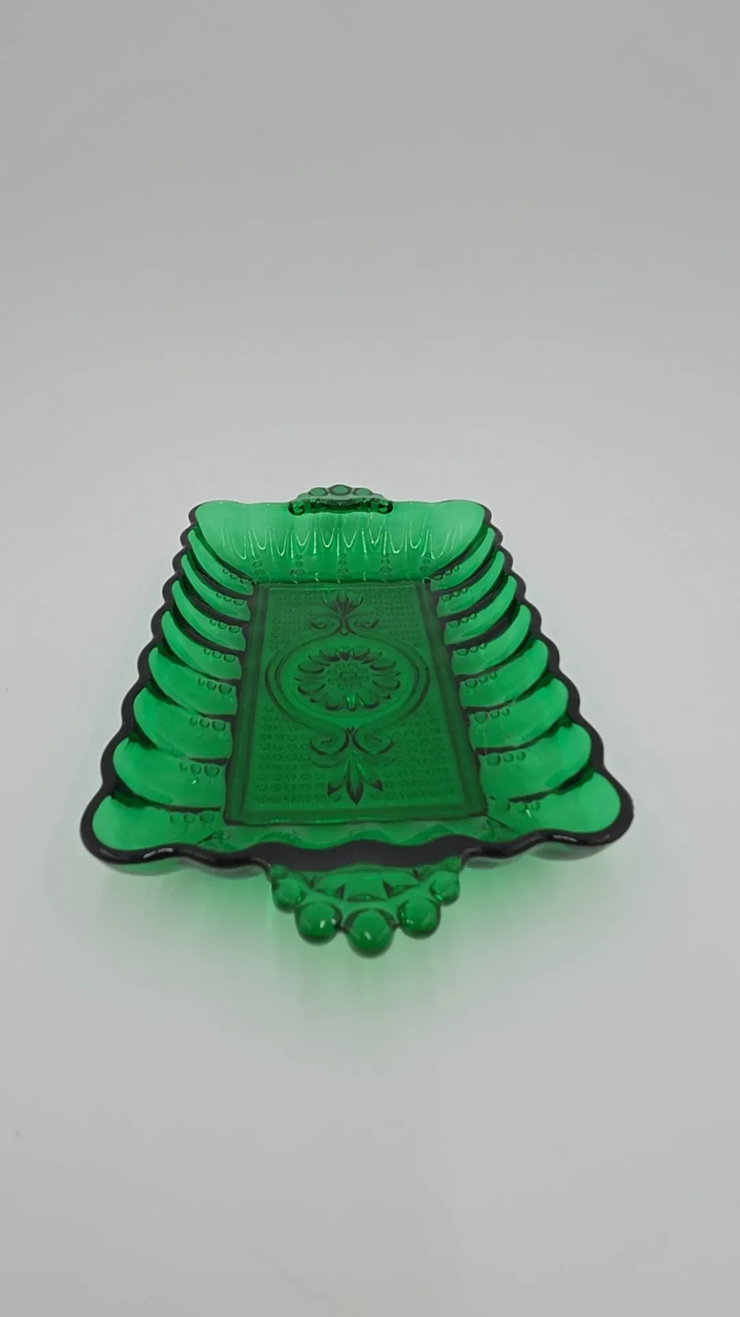 Green glass candy dish