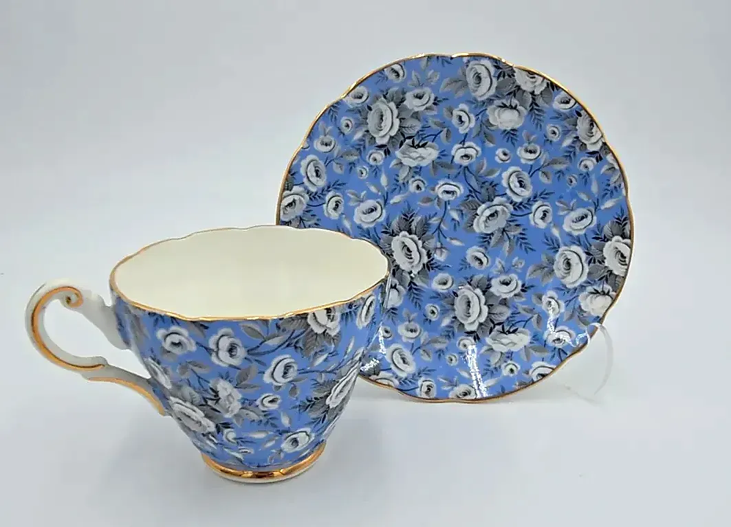 Vintage Grosvenor Bone China Tea Cup Saucer Blue Chintz Floral Gold England — side view