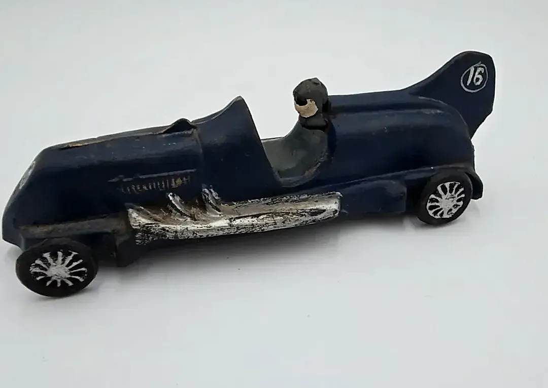 Vintage  Cast Iron Streamline Race Car # 6 — side view
