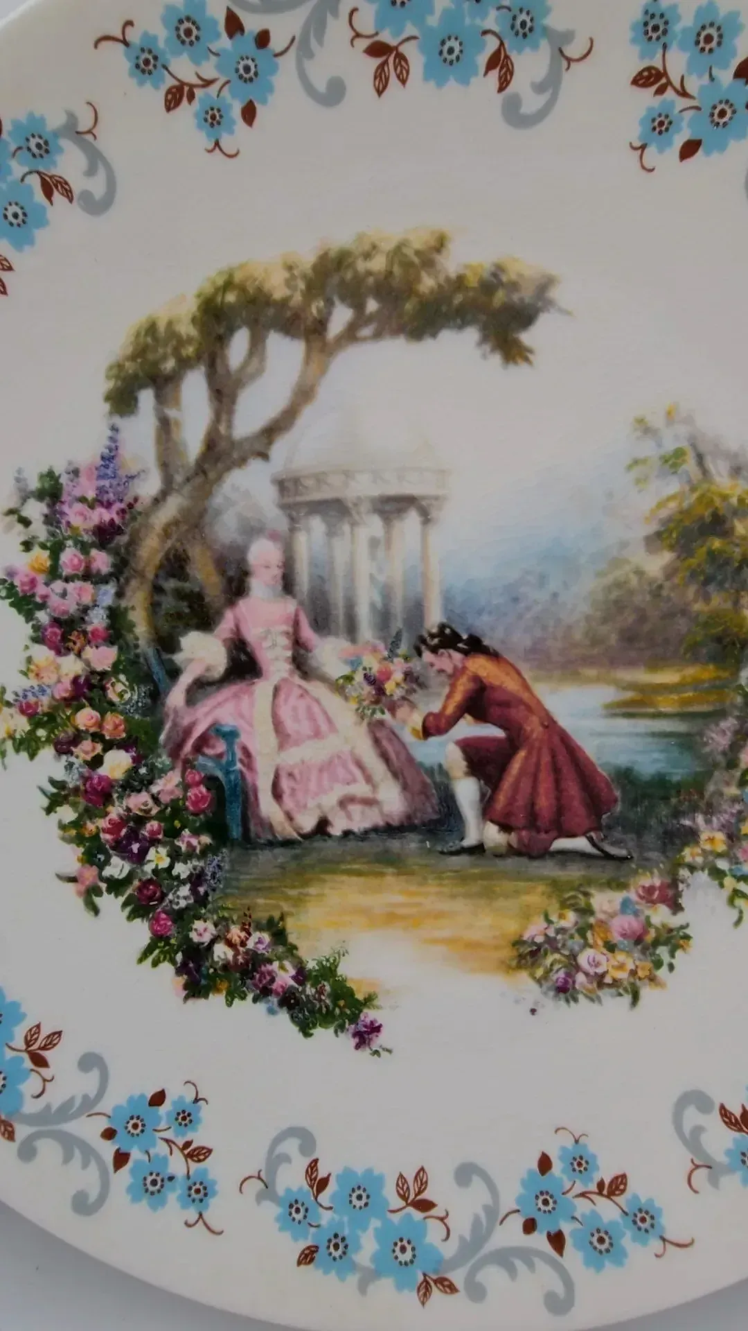 2 Vintage Crown Staffordshire 8" Plates Courting Couple Factory Hanging Holes — side view