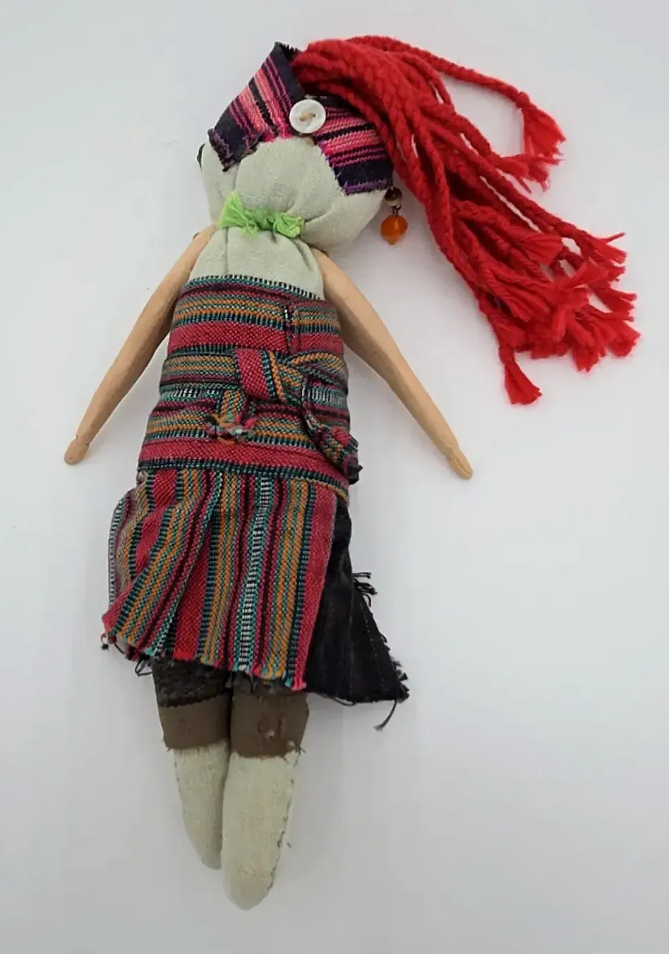 Handmade Folk Art Rag Doll Red Yarn Hair Wood Arms Textile — side view